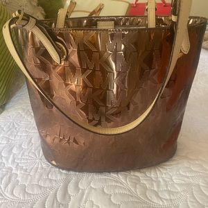 Metallic brown Michael Kors tote. Gently used.